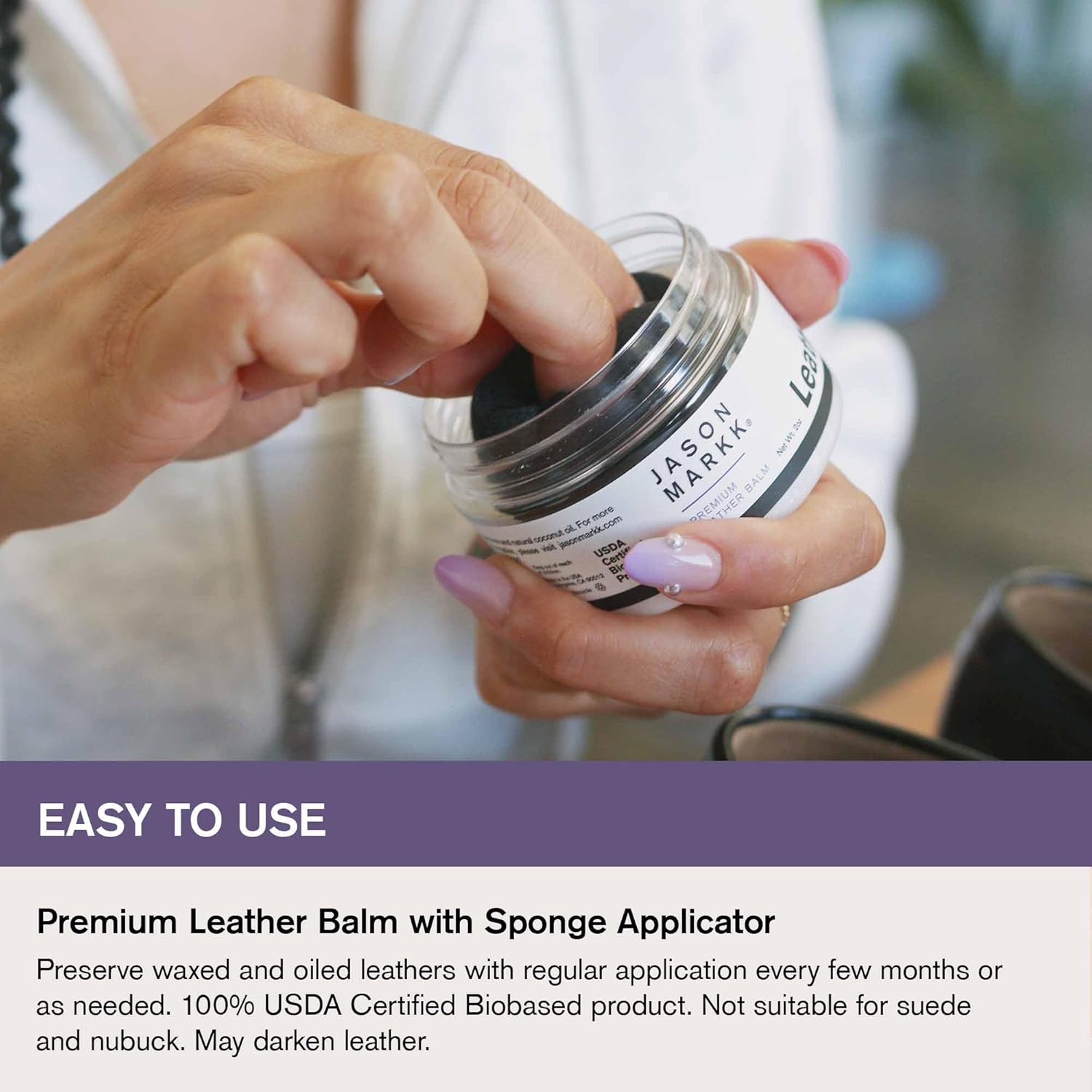 Person holding a jar of Jason Markk leather balm with a sponge applicator, text indicating ease of use.